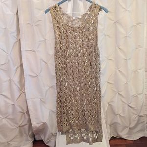 Leana Paris - color: Gold shimmer, woven material.